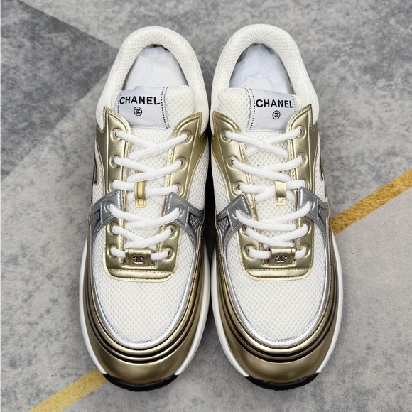 CHANEL Shoes - Chanel Women’s White & Gold Athletic Sneaker